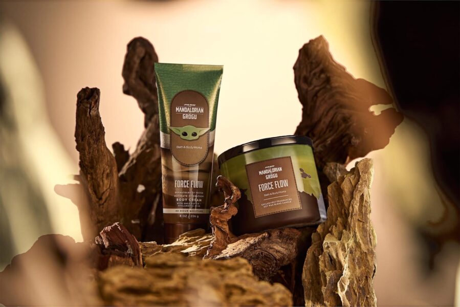 Product shot of Star Wars Mandalorian Grogu body care items on rocky display labeled Force Flow Bath Body Works green tube and jar