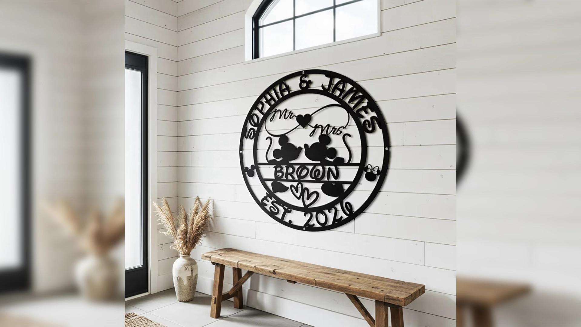 Black Circular Metal Wedding Plaque Reading mr Mrs with Heart and Silhouettes Names and est 2020 on a White Shiplap Wall
