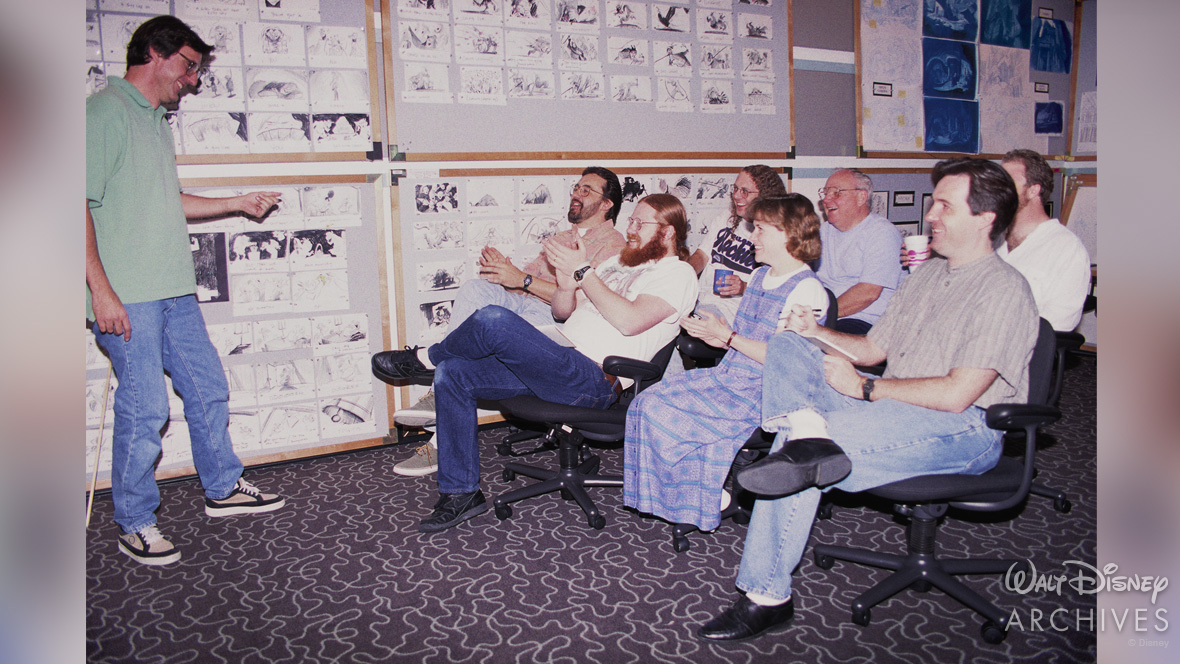 Story Meeting with Members of the Production Team Including Producer and Future Disney Legend Don Hahn Directors Gary Trousdale and Kirk Wise and Story Team Members Kevin Harkey standing Jeff Snow and Future Disney Legend Burny Mattinson