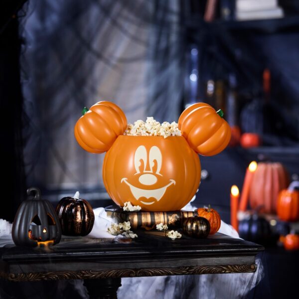 IMG0023 | The Main Street Mouse Orange Mickey Mouse Pumpkin Popcorn Bowl Overflowing with Popcorn on a Carved Table Surrounded by Small Jack o lanterns and Halloween Decor